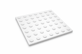 Square white tactile hazard tile with raised circular studs for underfoot and cane detection.