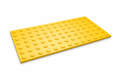 Yellow 300x600mm heavy-duty peel & stick TGSI hazard tile with raised tactile studs.
